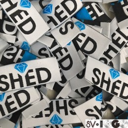 Этикетка жаккардовая вышитая SHED 20мм заказная (1000 штук)